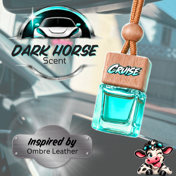 A car air freshener pendant with a turquoise liquid bottle and a wooden tag engraved with 'CRUISE', hanging from a brown cord. The background is a blurred car interior with 'DARK HORSE Scent' branding and 'Inspired by Ombre Leather' text.